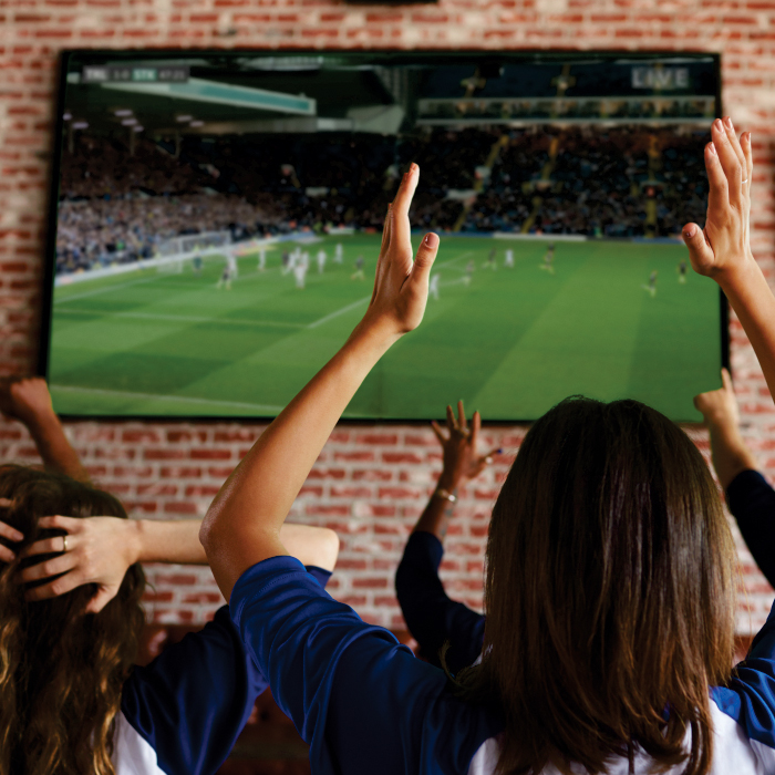 Sports Bar With TV Screen Lady Cheering