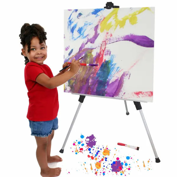 Toddler displaying artistic skill on a low raised aluminium easel